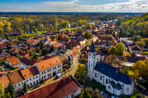 Obraz na płótnie Tokaj, Hungary - Aerial view of the Heart of Jesus Church at the main square of the town of Tokaj on a sunny autumn morning with blue sky and clouds w salonie