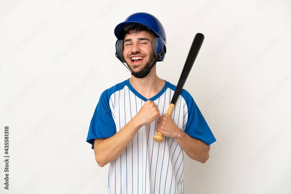 Young caucasian man playing baseball isolated on white background celebrating a victory Young caucasian man playing baseball isolated on white background celebrating a victory