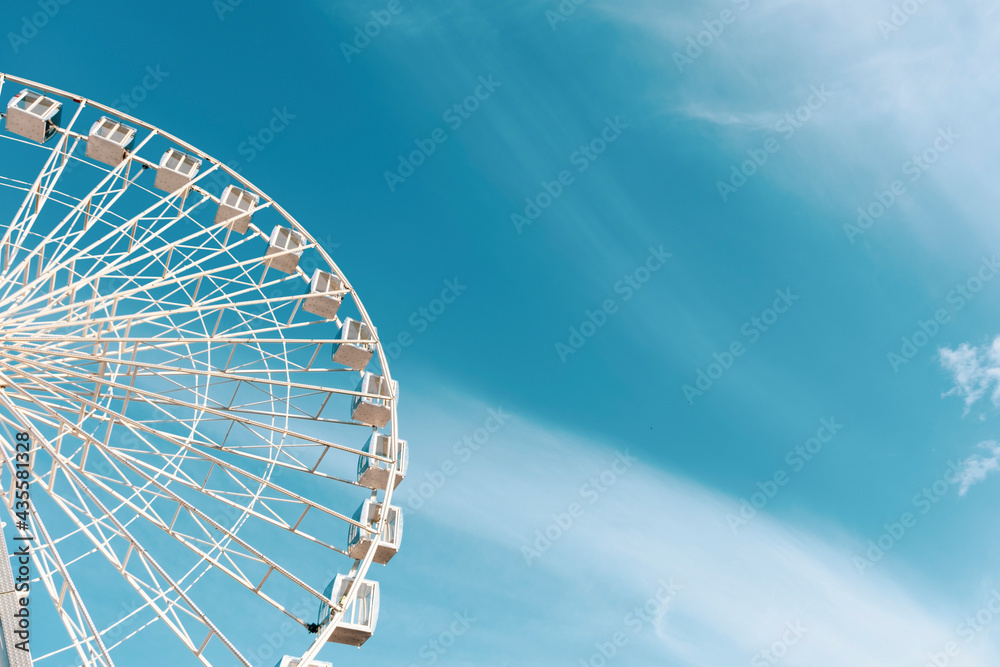 Big Ferris wheel. Amusement park.