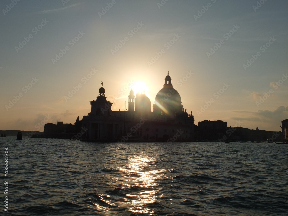 Silhouette of Venice´s Church Santa Maria Della Salute at the Evening with a Sunset an Reflections in the Lagoon