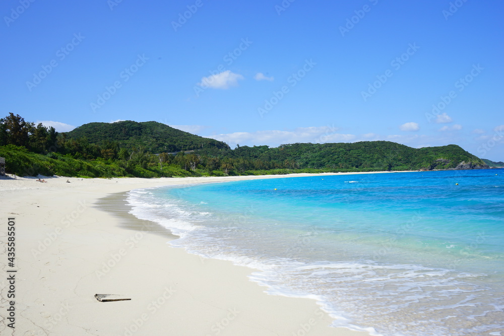 Beautiful summer scenery. calm waves on the blue water. Furuzamami Beach in Zamami island, Okinawa, Japan - 日本 沖縄 座間味島 古座間味ビーチ 青い海	