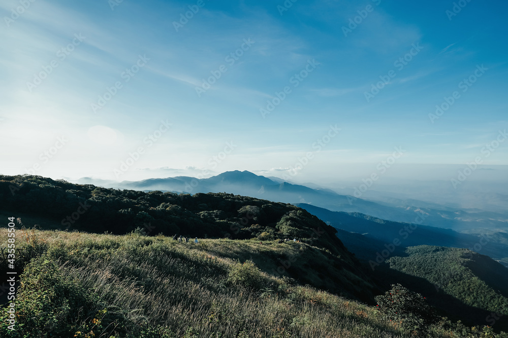 beautiful blue sky high peak mountains green forest guiding for backpacker camping backpacking hiking idea long weekend at Kew Mae Pan Nature Trail Waterfall Doi Inthanon, Chiang Mai, Thailand.