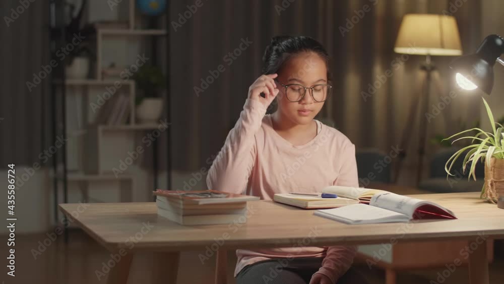 Asian Child Doing Homework And Headache At Night
Asian Child Doing Homework And Headache At Night