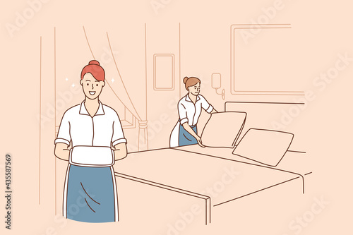 Cleaning service and housewife concept. Young smiling women cartoon characters working as housemaid making bed and cleaning hotels and apartments vector illustration 