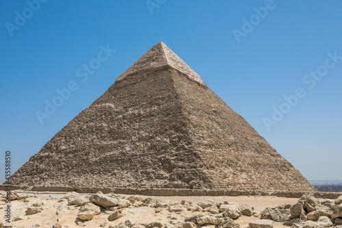 The Great Pyramids of Giza near the ruins of a temple in Giza  Egypt