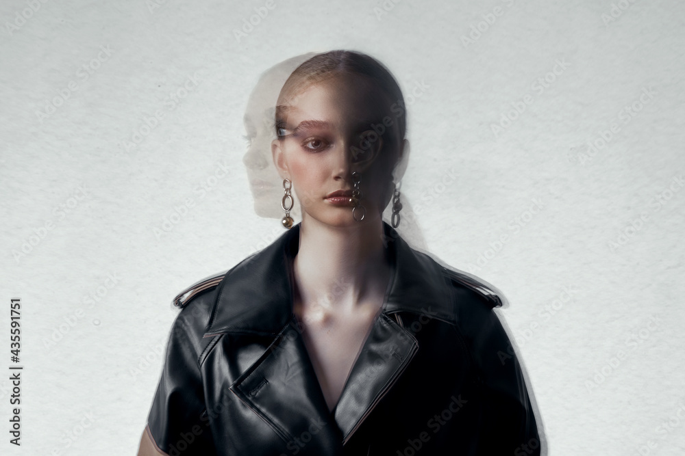 Beauty fashion young woman in trench coat, professional face makeup girl. Portrait of woman on white background. Spring clothing in rainy weather Beauty fashion young woman in trench coat, professional face makeup girl. Portrait of woman on white background. Spring clothing in rainy weather
