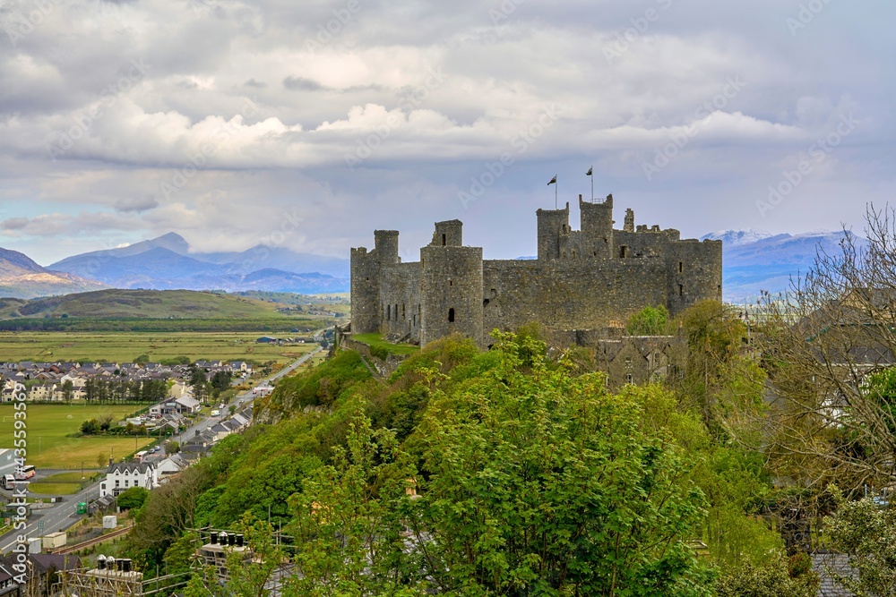 Harlech Castle with snowdonia mountain range in the background, Gwynedd, Wales