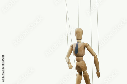 Control. Marionette on the strings. Business concept.