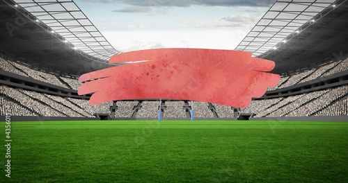 Composition of red squiggle with copy space over empty sports stadium with rugby field