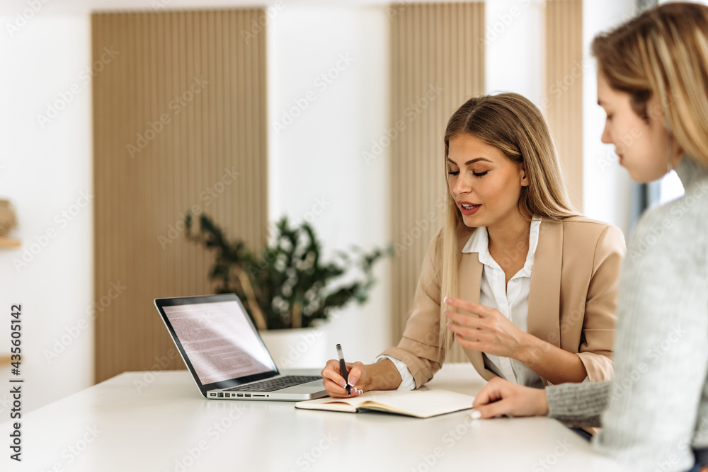 Focused people, team work, signs some contracts together.