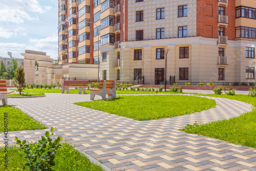 Landscaped courtyard of a modern urban residential complex.