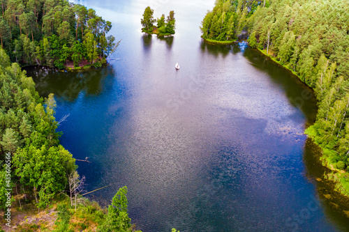 Aerial view yacht on lake in Tuchola Forests, Poland. photo