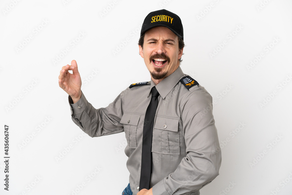 Young caucasian security man isolated on white background making guitar gesture Young caucasian security man isolated on white background making guitar gesture