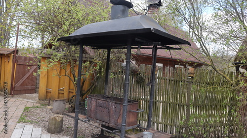 village yard in Belarus with various objects