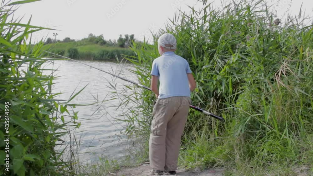 boy fishing with a fishing rod on the lake,boy fishing with a fishing rod on the lake boy fishing with a fishing rod on the lake,boy fishing with a fishing rod on the lake