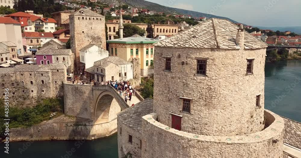 4K Footage Aerial View to the Old Bridge (Stari Most) in Mostar via the river Neretva, Bosnia and Herzegovina 