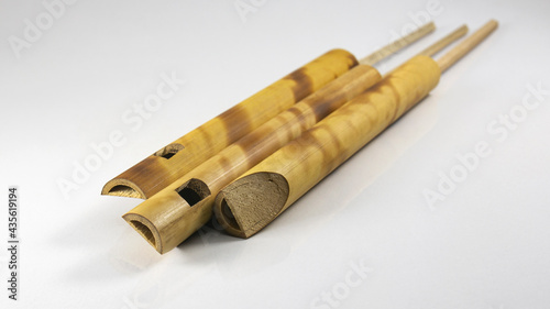 Few small bamboo flutes. popular toy gift of children with sweet sounds. Flute Imitator Bird Sound.