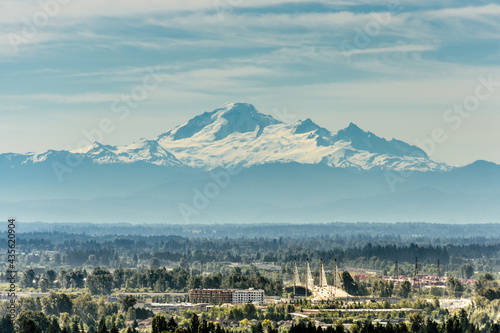 A view of the enormous Mount Baker, Washington as seen all the way form Coquitlam, British Colombia photo
