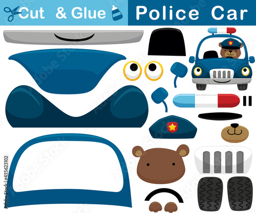 Cartoon of funny bear on police car. Education paper game for children. Cutout and gluing