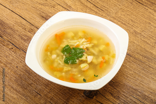 Tasty chicken soup with carrot