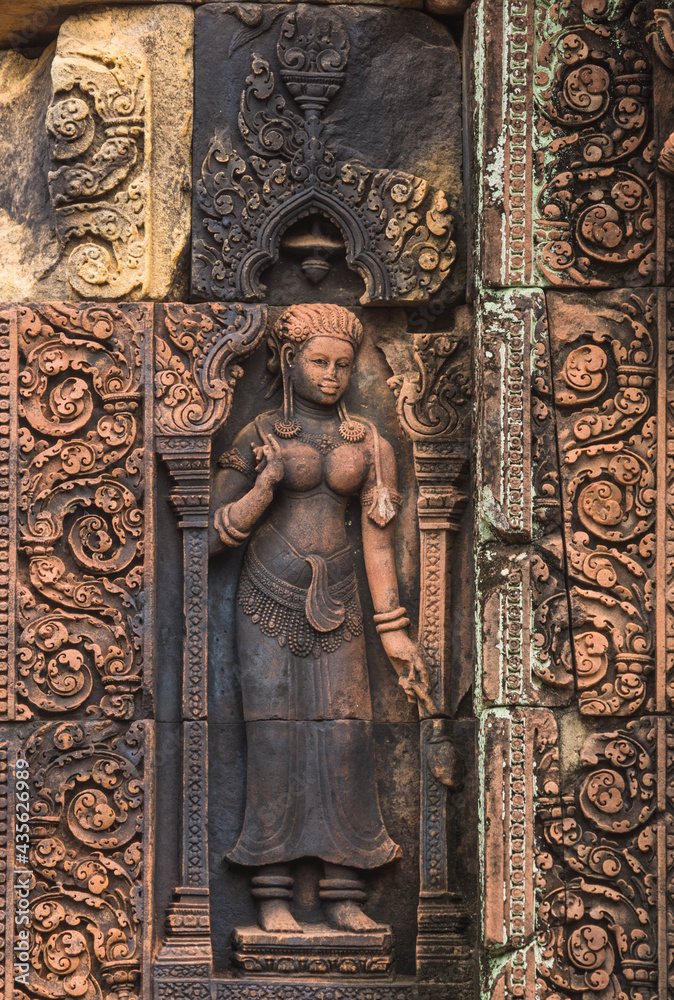 The sandstone carvings of Banteay Srei, one of Cambodia's most beautiful Khmer castles.