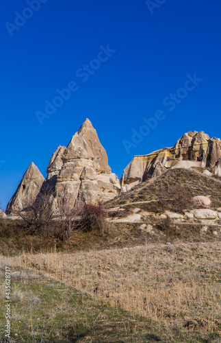 Vertical view of a field with typical rock formations and fairy chimneys in Cappadocia, Turkey