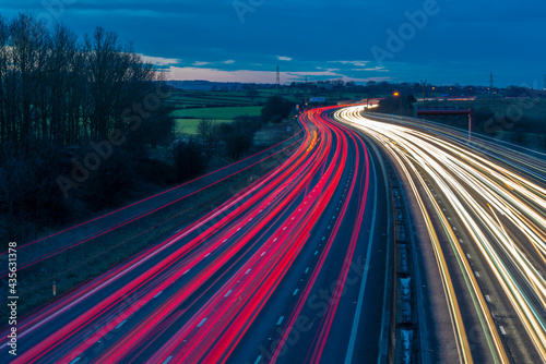 View of traffic trail lights on M1 motorway near Chesterfield, Derbyshire, England, United Kingdom