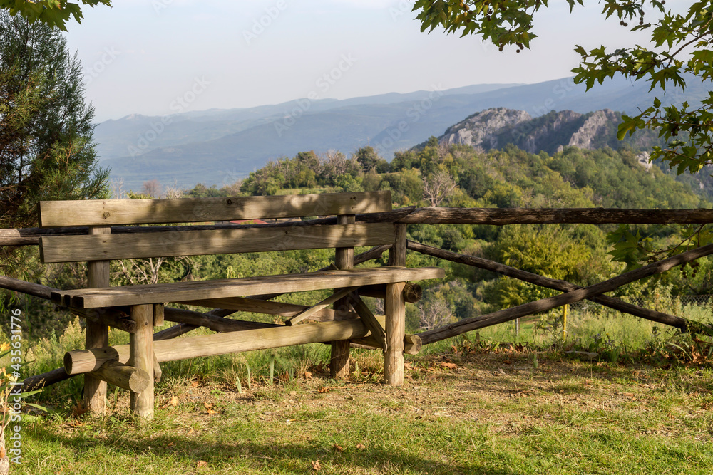 Beautiful, wooden bench in the mountains (Central Macedonia, Greece)