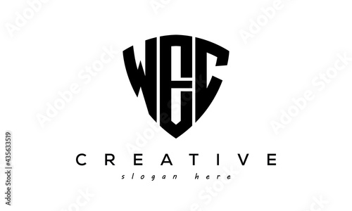 WEC letters creative logo with shield photo