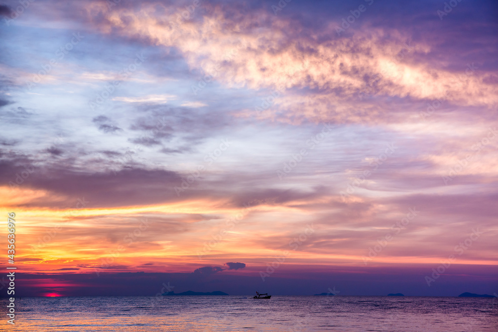 Beautiful sea view landscape with dramatic sunset cloud sky