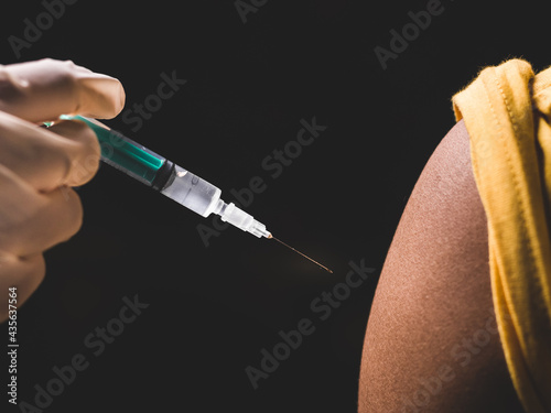 Tableau sur toile Patient getting vaccinated against the flu covid19 or corona virus every year by the Ministry of Health at hospital in concept illness, outbreak, healthcare in life