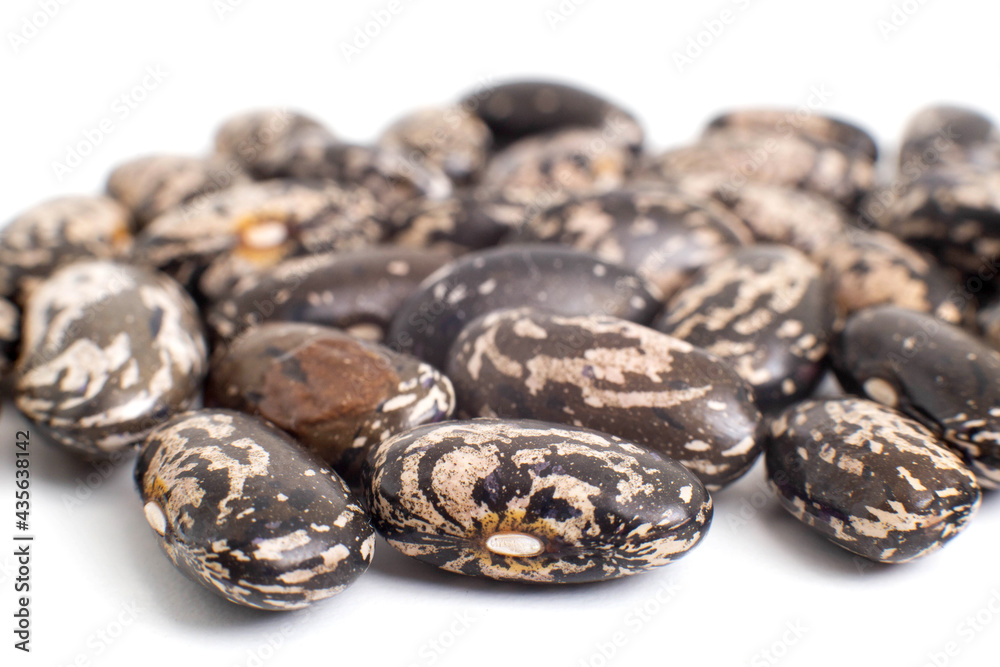 Black beans on a white background, isolate, close-up Black beans on a white background, isolate, close-up