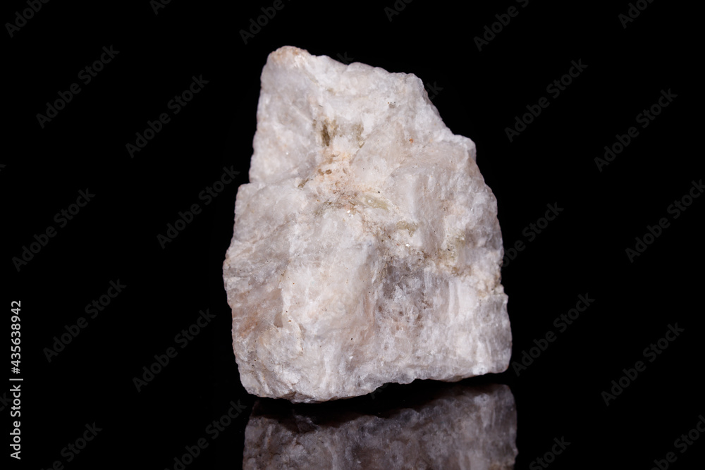 Macro mineral stone Wollastonite on black background Macro mineral stone Wollastonite on black background
