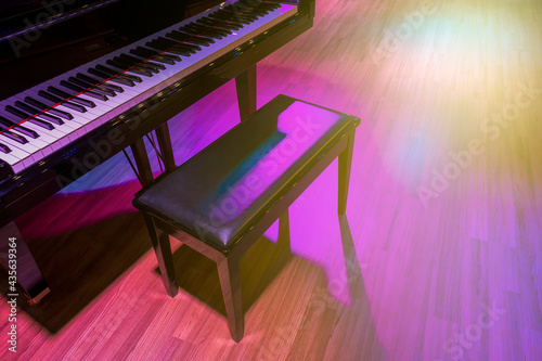Piano and chair for playing on stage