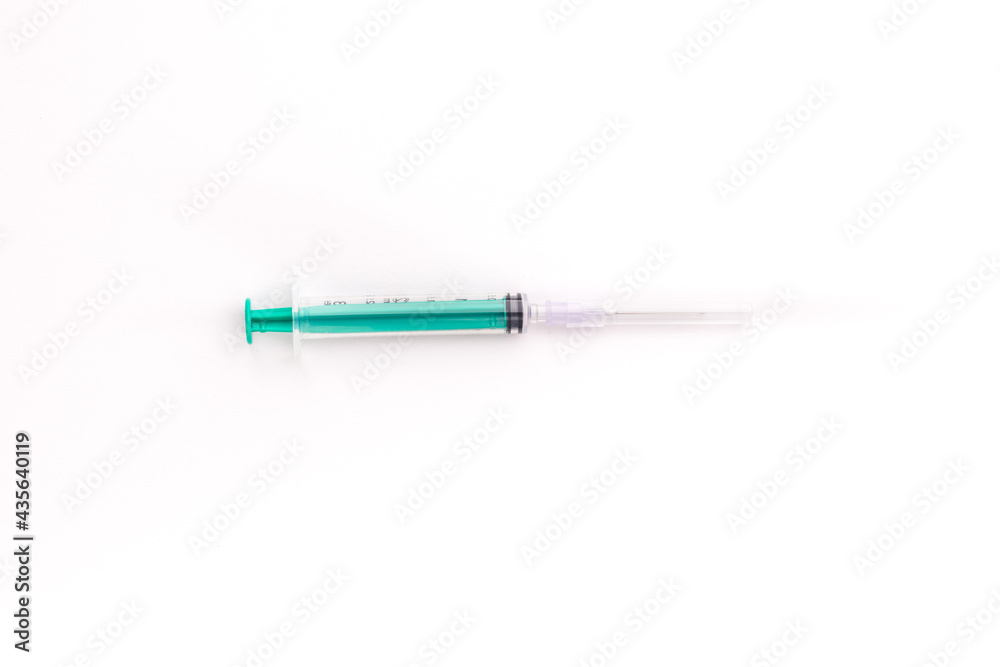 Plastic Syringe isolated stock image on texture background. Plastic Syringe isolated stock image on texture background.