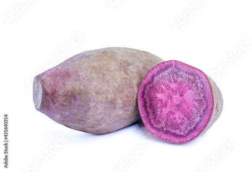 Purple sweet potato and half purple sweet potato on white background	