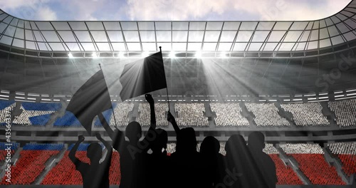 Animation of silhouettes of sports fan cheering with chilean flag over sports stadium photo