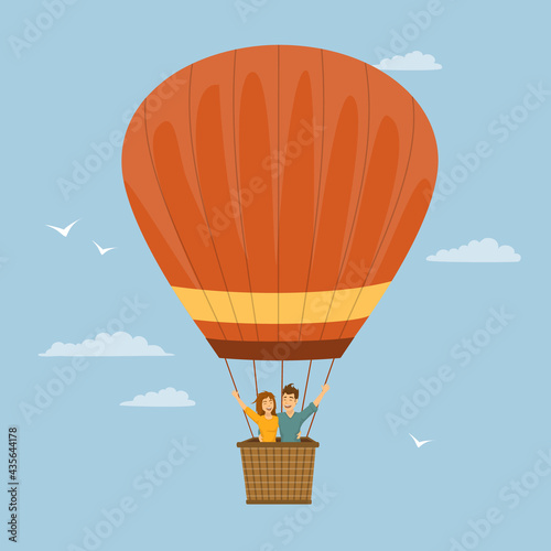 happy funny couple flying in a hot air balloon romantic trip