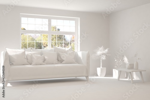 Stylish room in white color with sofa and autumn landscape in window. Scandinavian interior design. 3D illustration © AntonSh