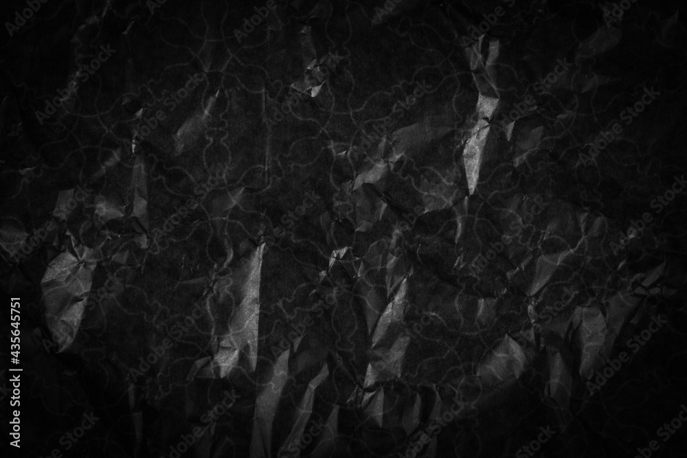 Background with crumpled black paper texture