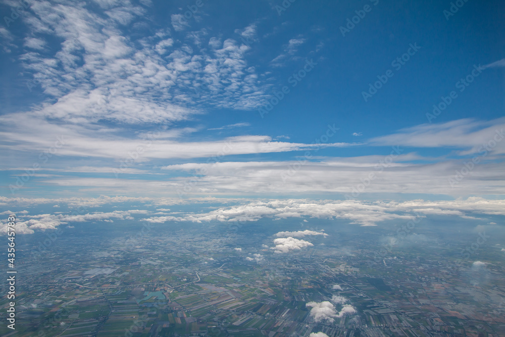 In the sky above the clouds