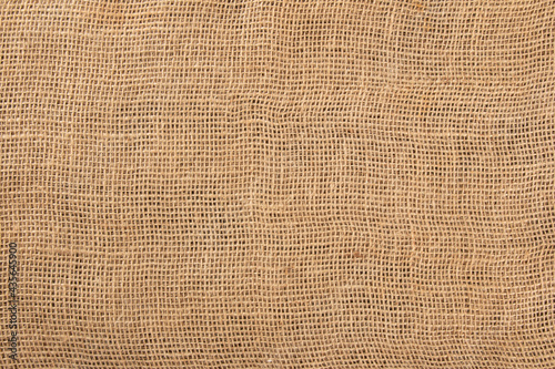 Background with texture of jute fabric close up
