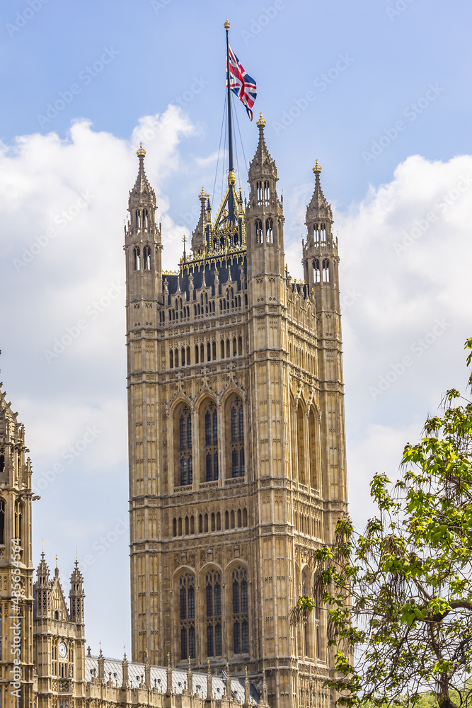 Victoria Tower - largest and tallest (98 m) tower of Palace of Westminster. Palace of Westminster (or Houses of Parliament) located in City of Westminster, London. Victoria Tower - largest and tallest (98 m) tower of Palace of Westminster. Palace of Westminster (or Houses of Parliament) located in City of Westminster, London.