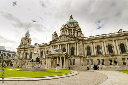 The Belfast city hall with queen Victoria sculpture. Northern Ireland, UK