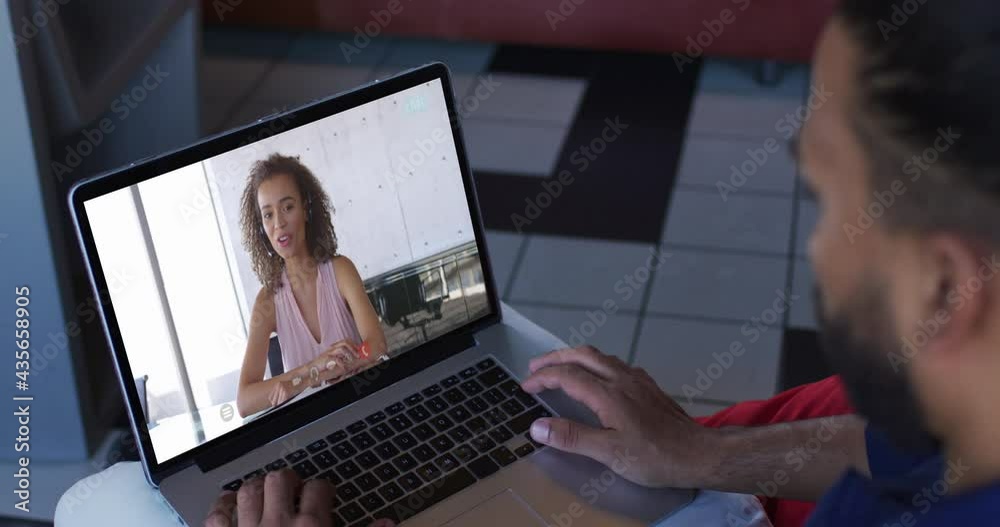 African american businessman using laptop having video call with female colleague African american businessman using laptop having video call with female colleague