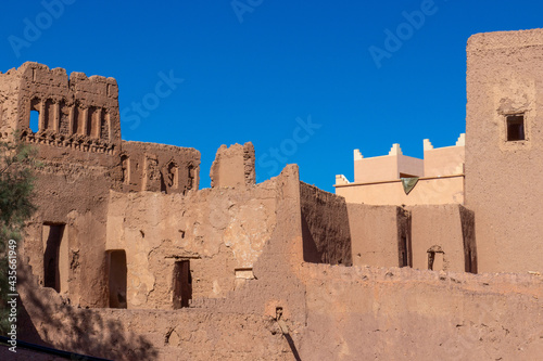 Clay walls of Kasbah of Taourirt against blue sky in Ouarzazate  Morocco