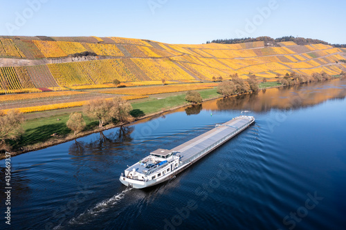 Aerial view, Germany, Rhineland-Palatinate, region Bernkastel-Wittlich., Kesten, Mosel, cargo ship on the Moselle in autumn photo