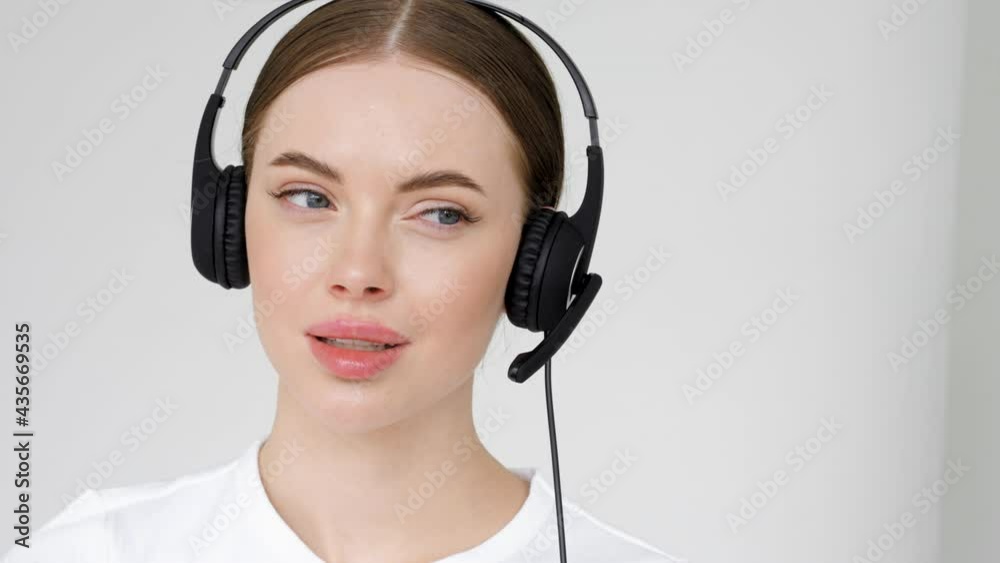 Call center operator woman close up face portrait headsethsppy smile model Call center operator woman close up face portrait headsethsppy smile model