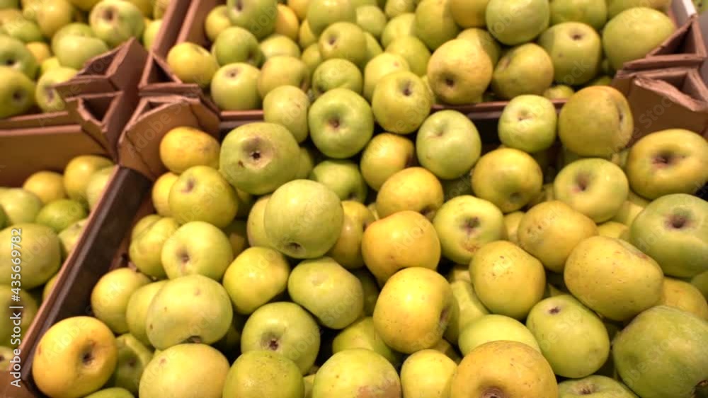 PAN Shelf full of fresh yellow and green apples. Nobody PAN Shelf full of fresh yellow and green apples. Nobody