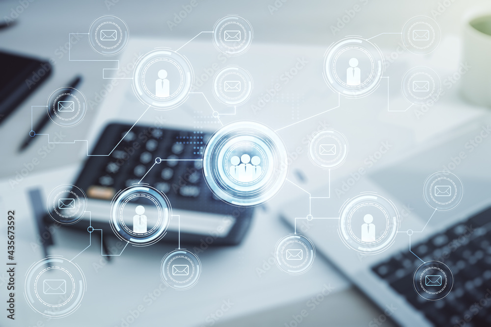 Abstract virtual social network concept on calculator and laptop background. Multiexposure Abstract virtual social network concept on calculator and laptop background. Multiexposure